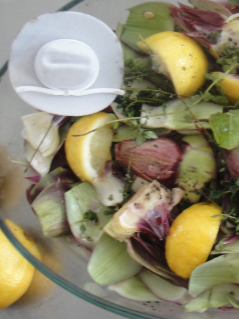 Artichokes and herbs ready for roasting